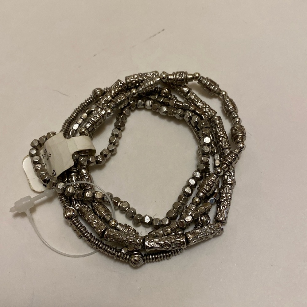 NEW MULTI STRAND ELASTIC SILVER BRACELET